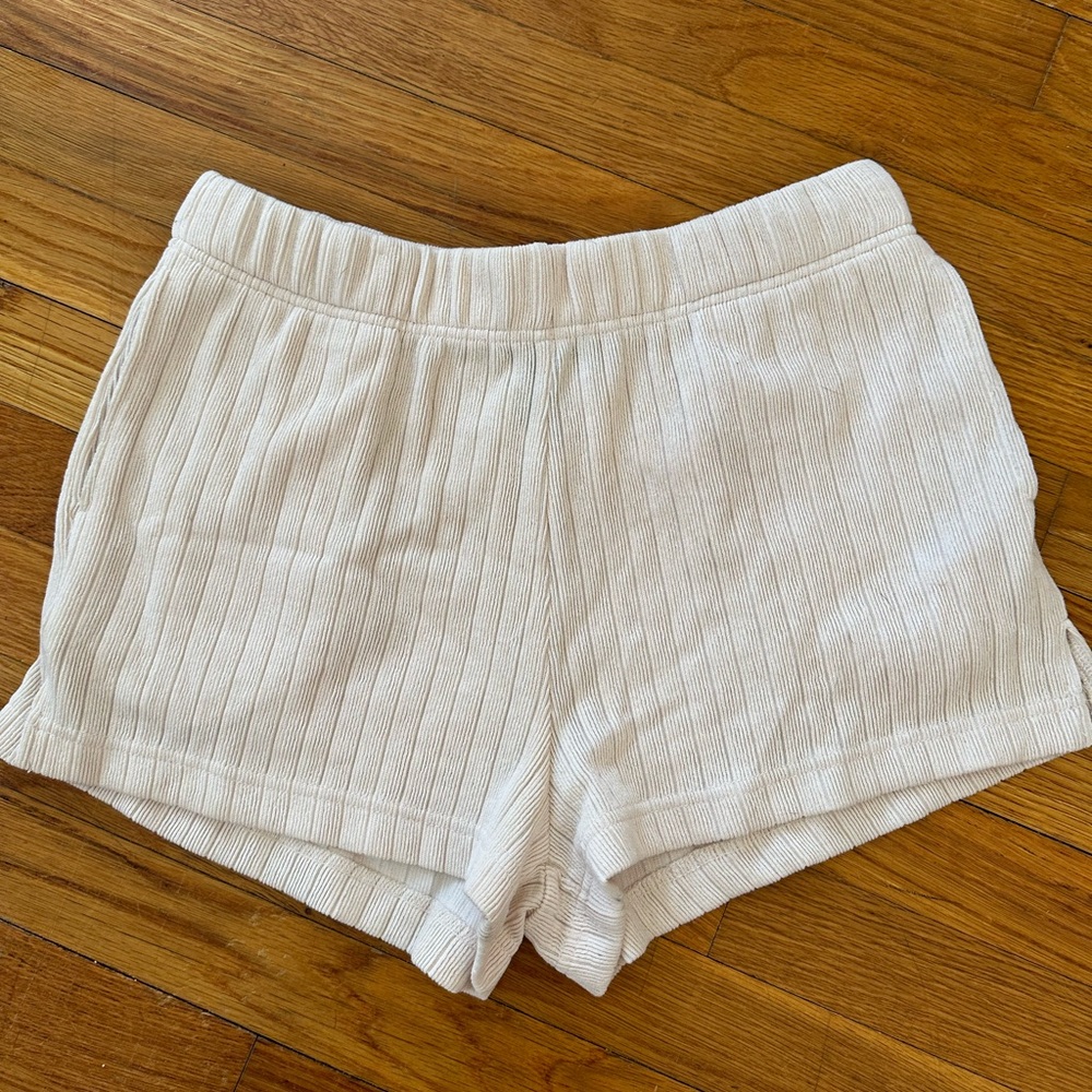 White ripped shorts